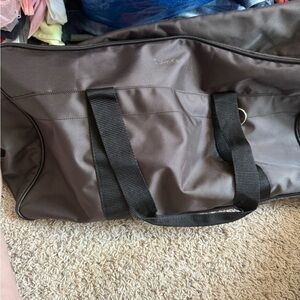 Calvin Klein Brown and Black Duffel Bag with Stylish Design